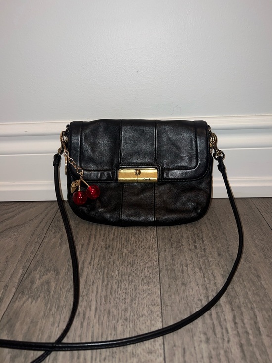 Coach Handbags - 🍒 Coach Black Leather Crossbody with Red Cherry Charm
